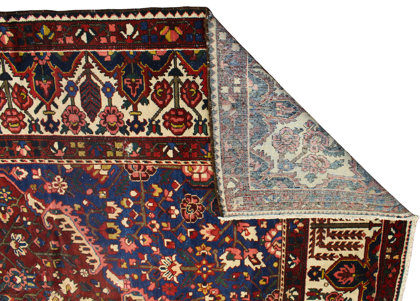 14x16 wool Persian rug with floral and tribal motifs