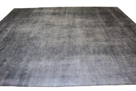 Gray checkered rug on a white background