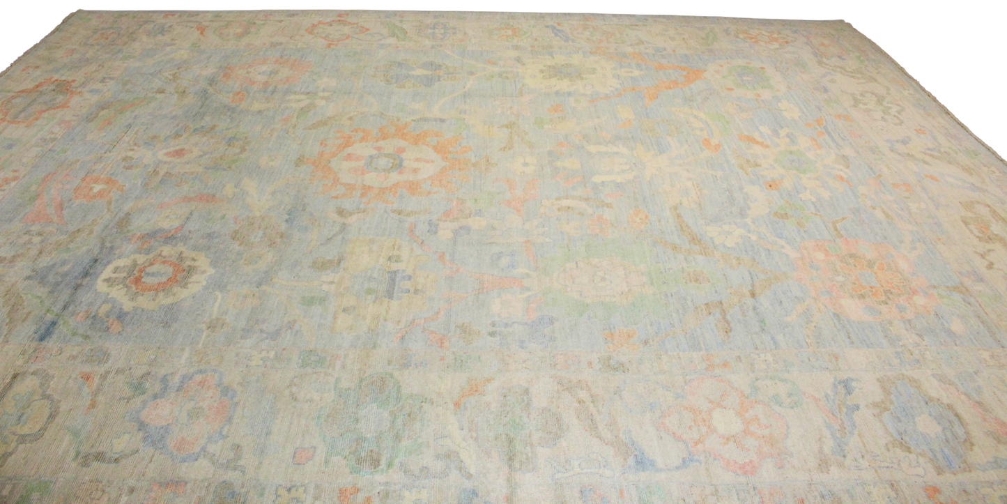Patterned rug with floral designs on a plain background