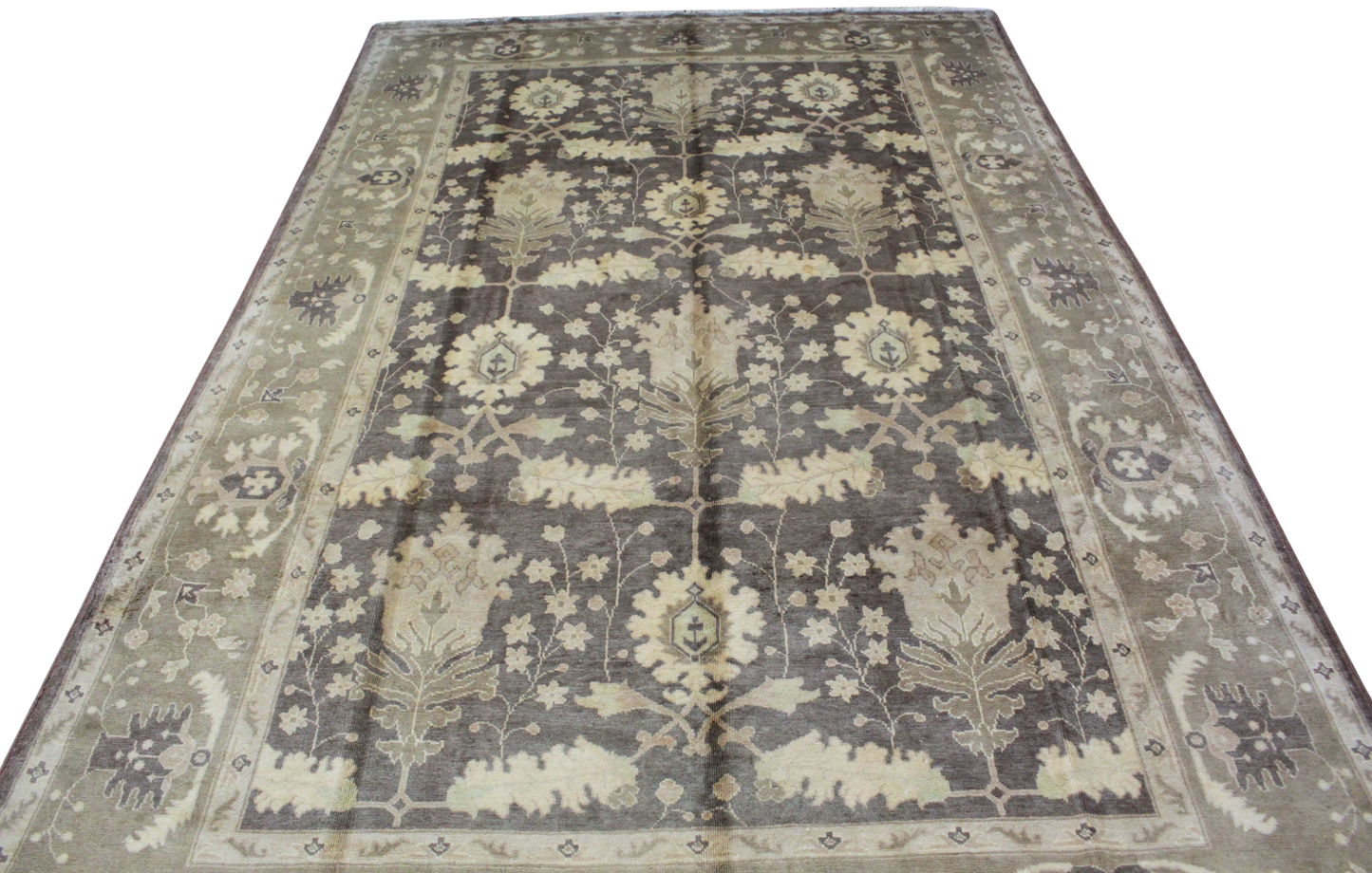 Mahal rug with abrash brown and wheat tones