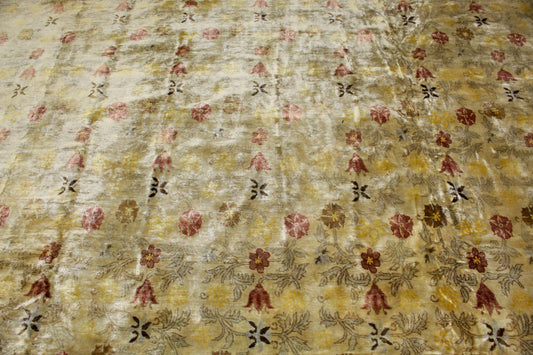 Textile with floral pattern on a beige background