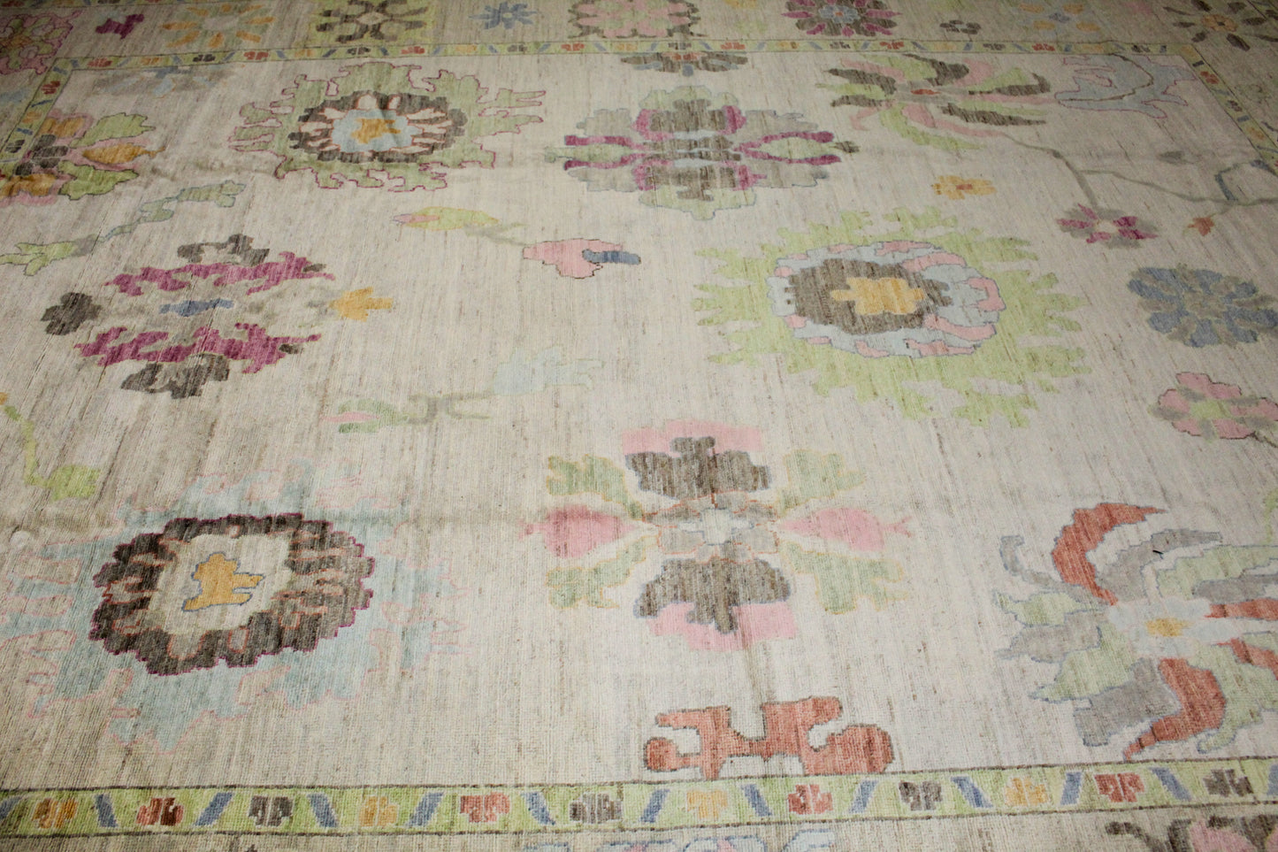 luxury Oushak area rug with pastel floral pattern