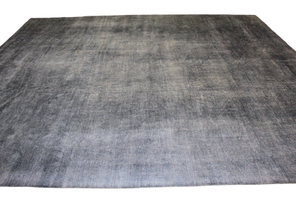 Gray checkered rug on a white background