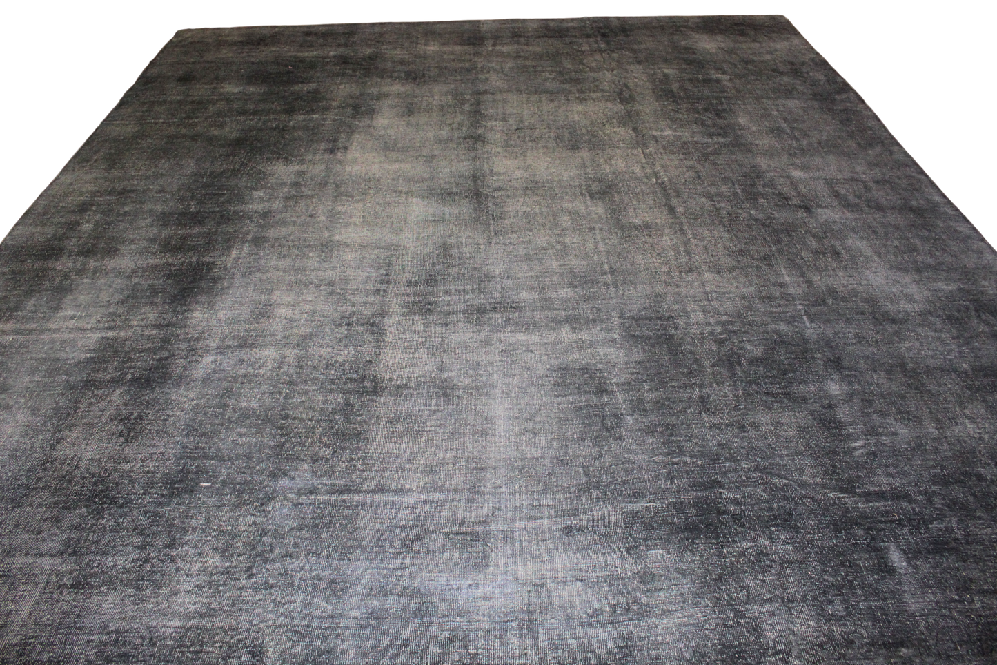 Gray textured rug on a white background