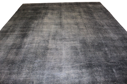 Gray textured rug on a white background