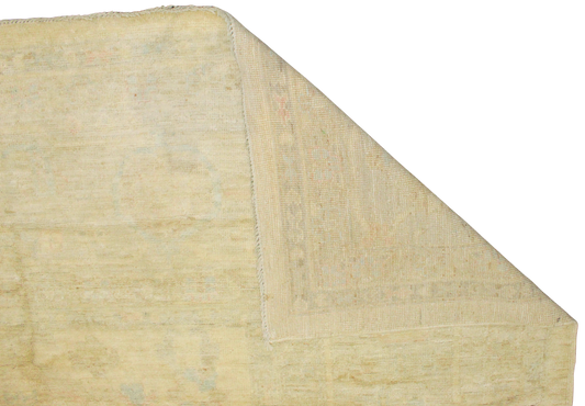 Beige textured rug corner on a white background