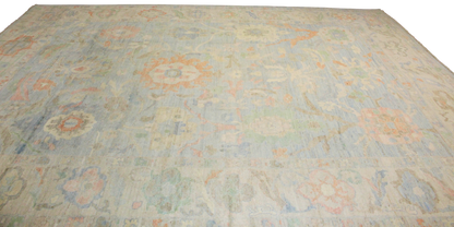 Patterned rug with floral designs on a plain background
