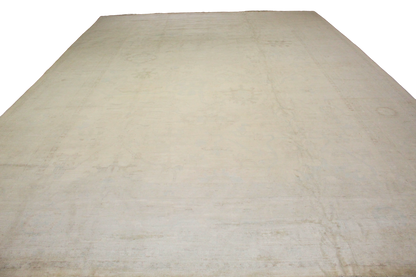 Beige quilted blanket on a white background