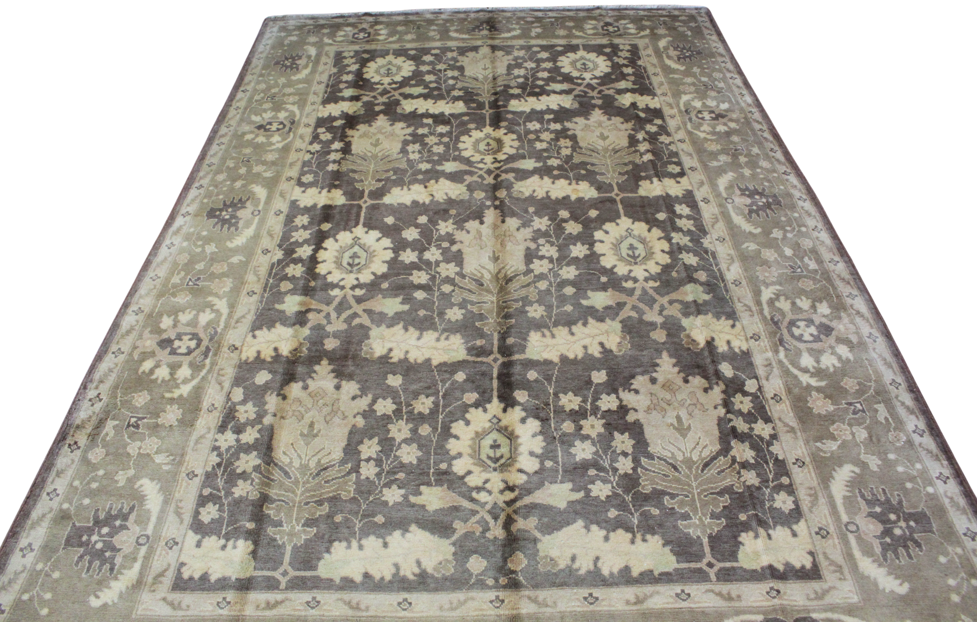 Mahal rug with abrash brown and wheat tones