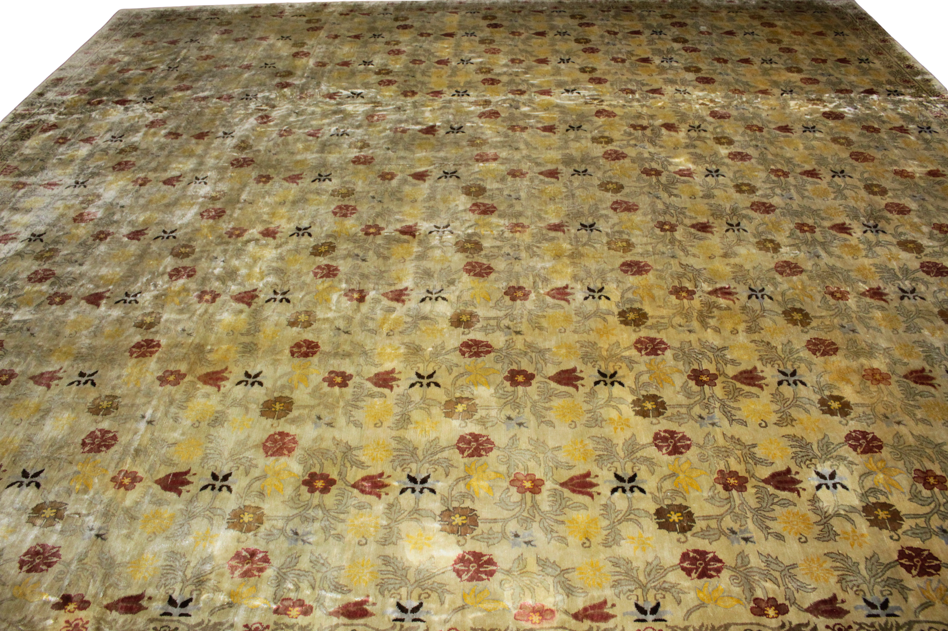 Patterned rug with floral design on a plain background