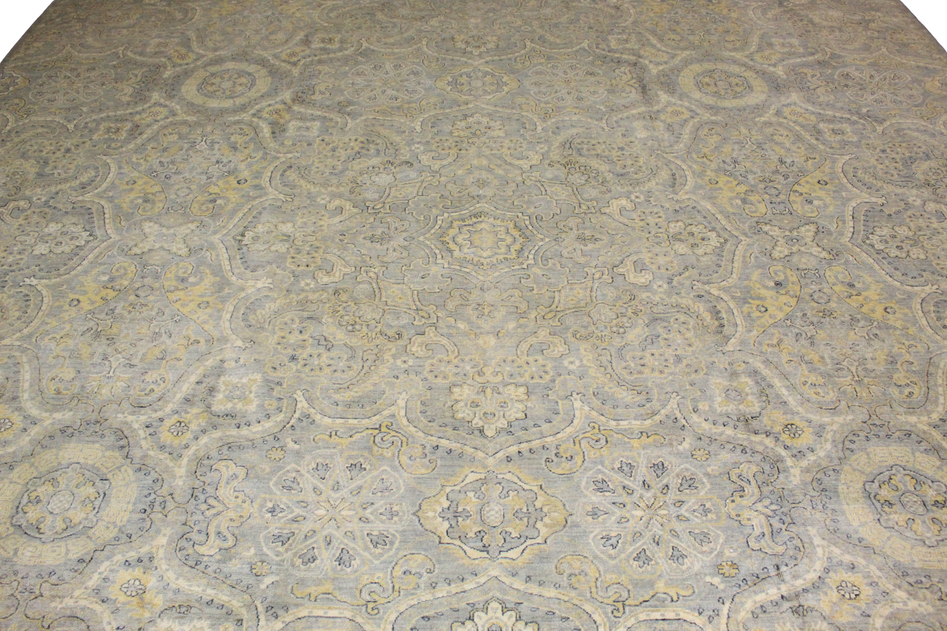 Patterned rug with intricate design on a neutral background