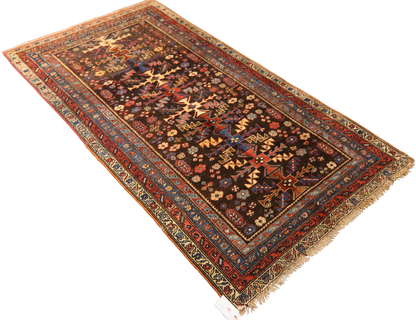 Persian wool rug with tribal tree of life pattern
