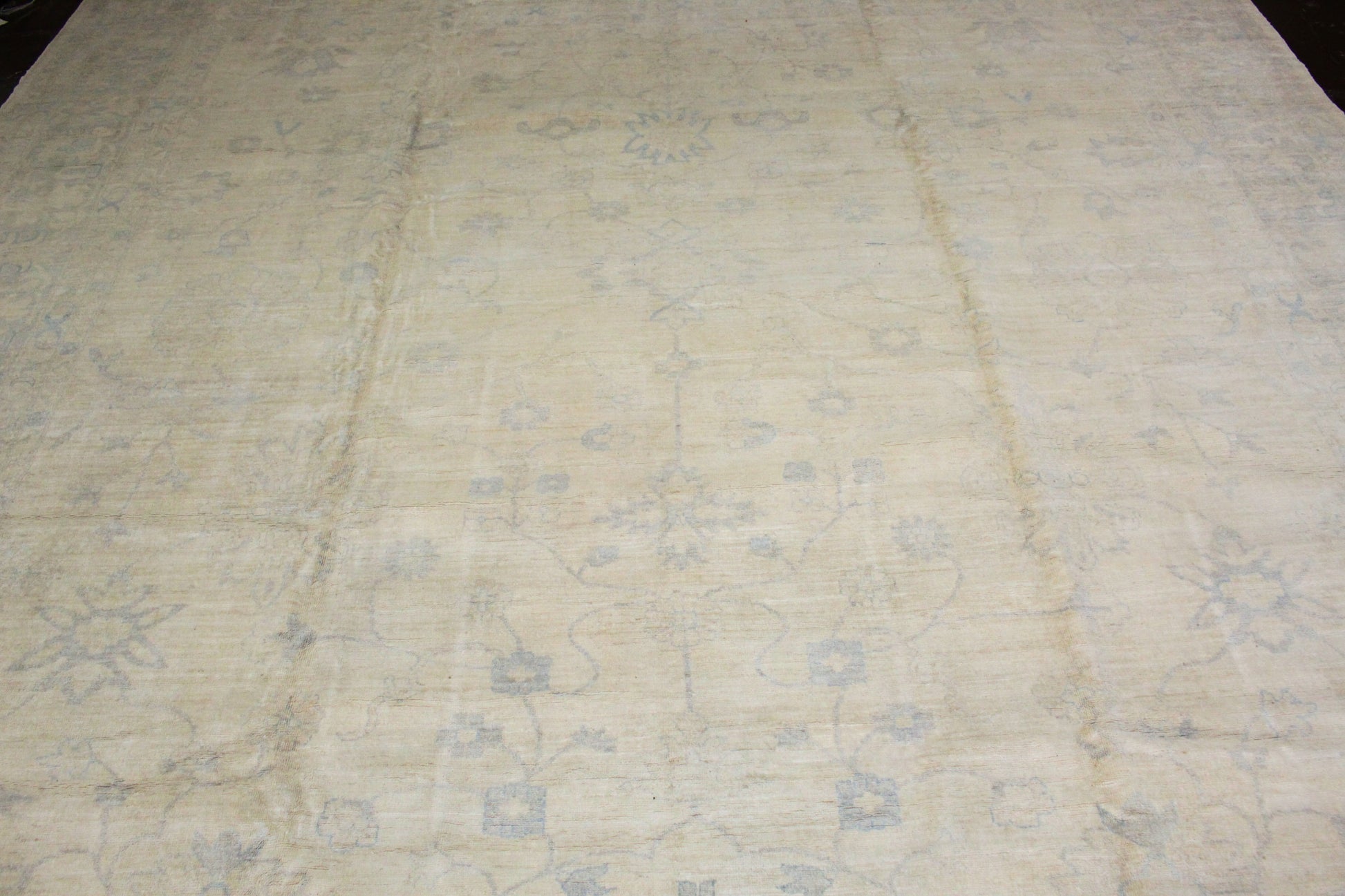 Textured beige fabric with a subtle pattern