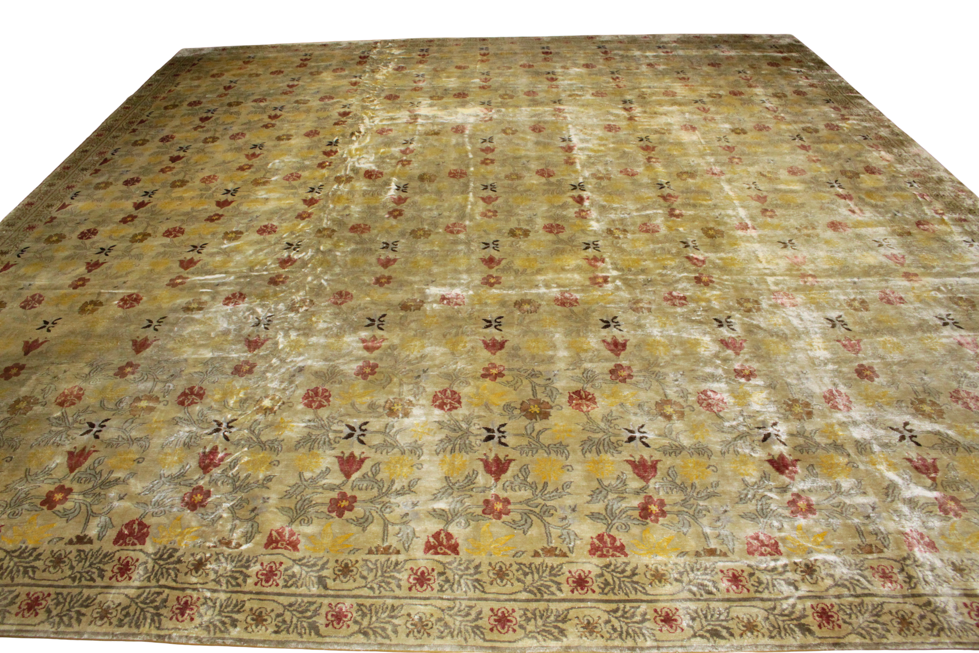 Vintage floral-patterned rug with a beige background