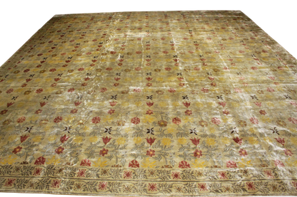 Vintage floral-patterned rug with a beige background