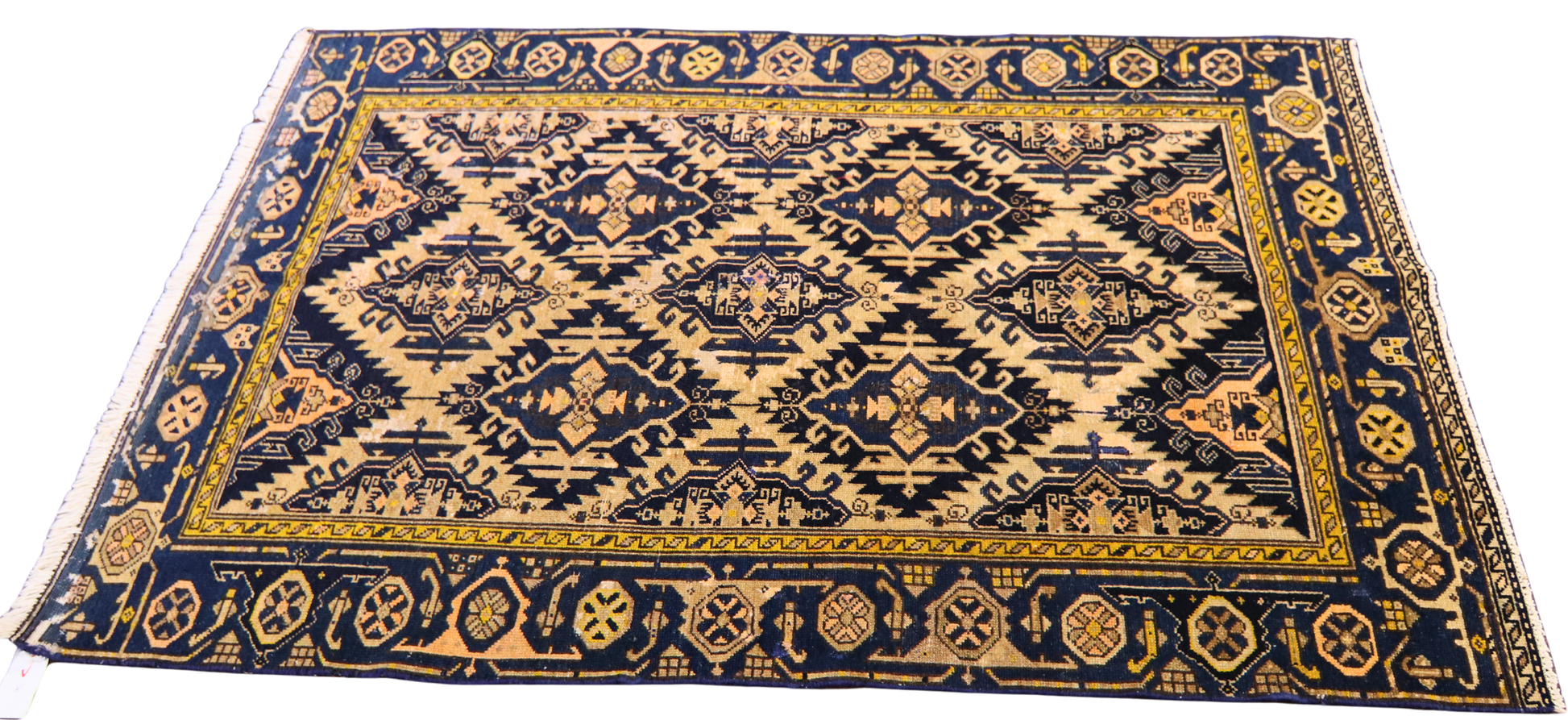 antique Persian accent rug with soft peach tones

