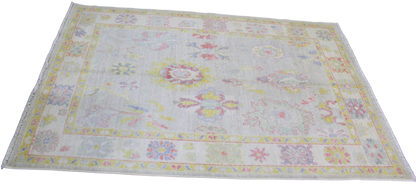 decorative Oushak rug for nursery or reading nook
