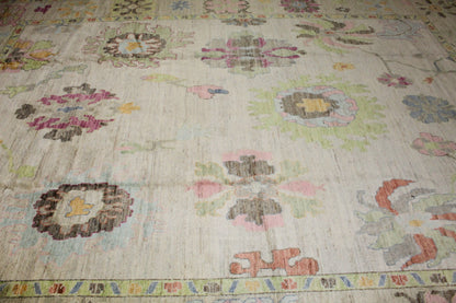 luxury Oushak area rug with pastel floral pattern