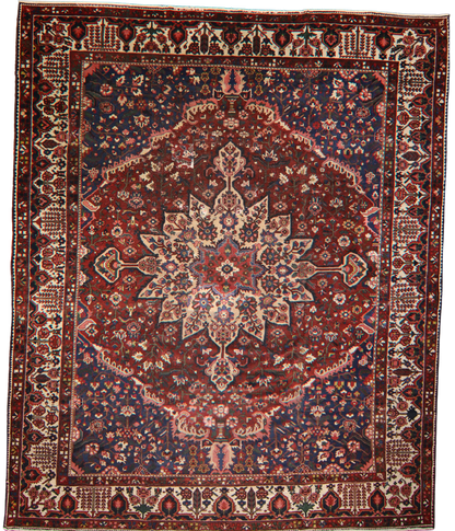 oversized antique Persian rug with classic design